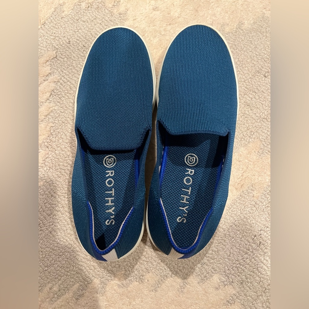 Rothy's rare teal slip on tennis shoes with heal stripe.